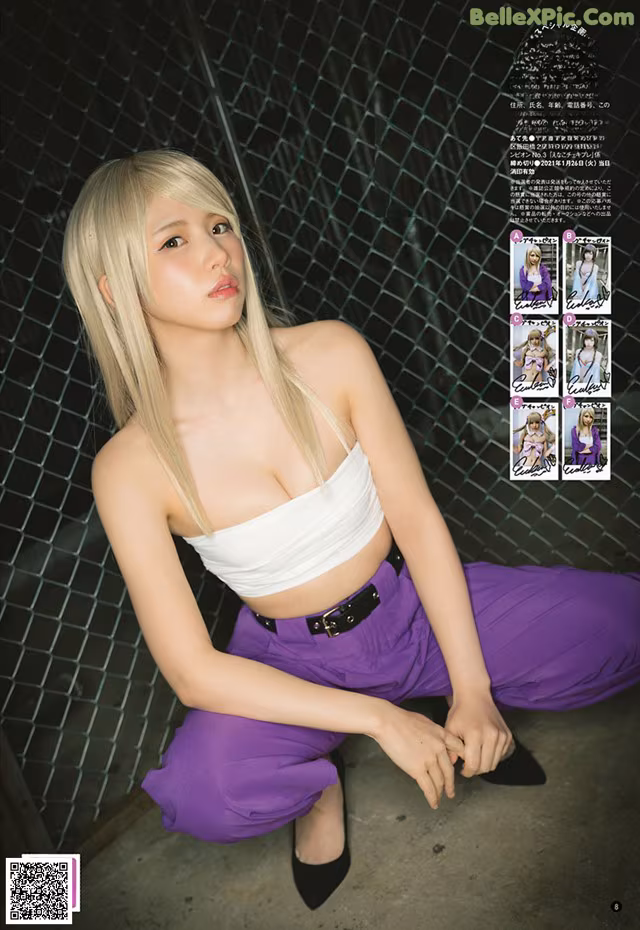 A woman in a white top and purple pants posing for a magazine.
